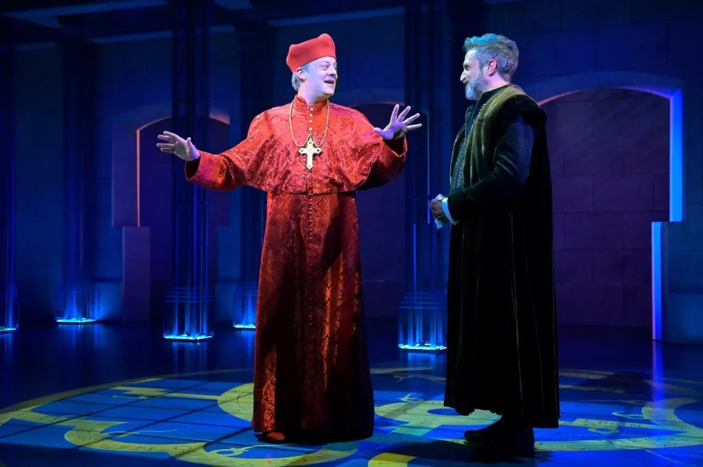  Jeremy Kushnier, left, plays a bishop who becomes pope, and an enemy to Galileo (Raúl Esparza), in the world premiere of “Galileo: A Rock Musical.” (Courtesy Kevin Berne)  |  https://localnewsmatters.org/2024/05/17/review-truth-takes-on-power-in-berkeley-reps-bold-new-musical-galileo/